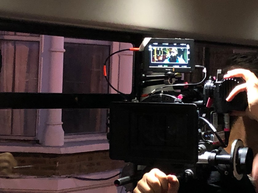 Cinematographer behind camera