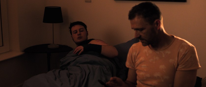 Anto sits on Orin's bed